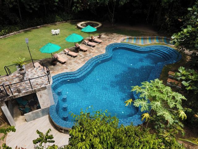 جانجل فيليدج باي ثاوذيسا