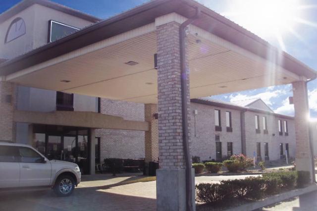 كواليتي إن آند سويتس