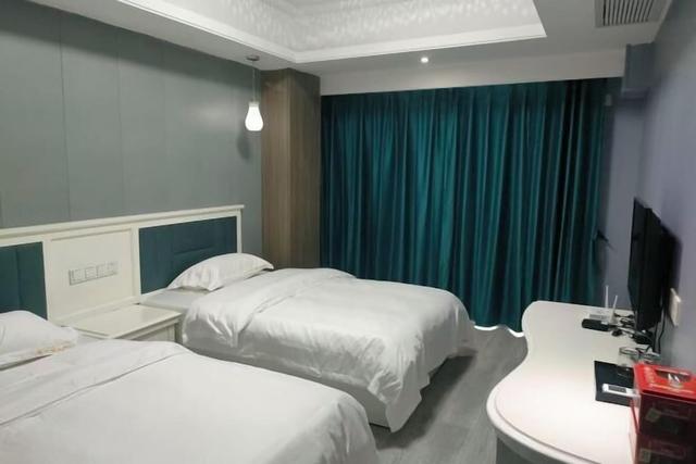 Shengchang Hotel (Xishuangbanna Gaozhuang Xishuangjing Branch)